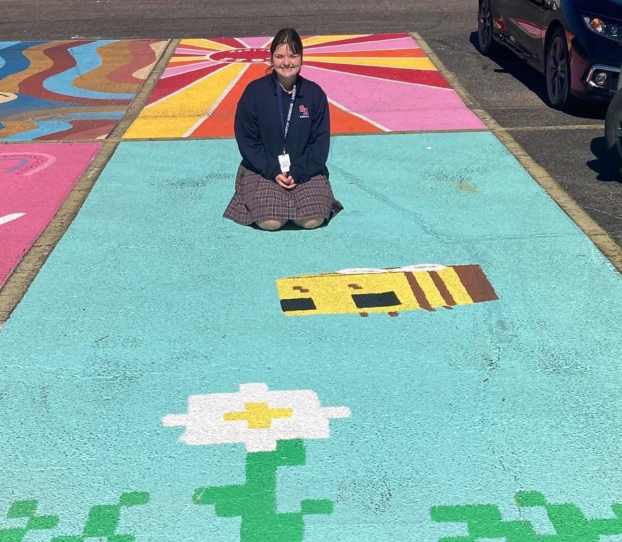 Alyssa Haase shows off her newly painted parking space. 