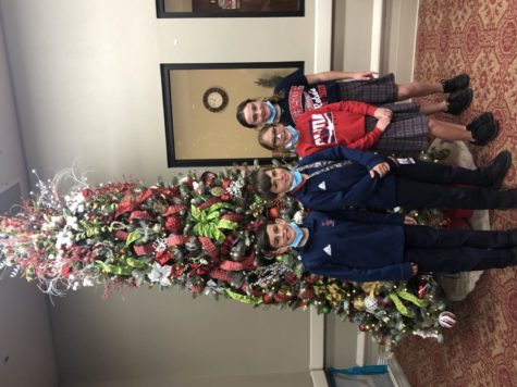Riverside Junior Beta Club Officers Owen Guidry, Cole Jacob, Brinley  Roccaforte and Layla Price  delivered blankets and socks to a local senior living center