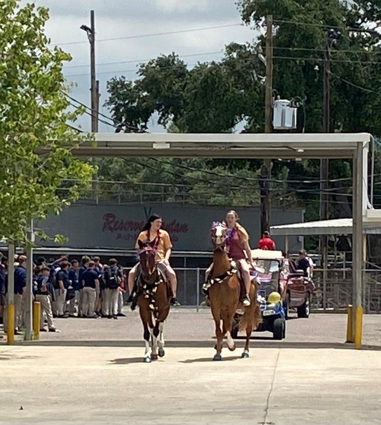Senior cousins Layken and Alysa Epperly led the senior parade on a pair of horses. 