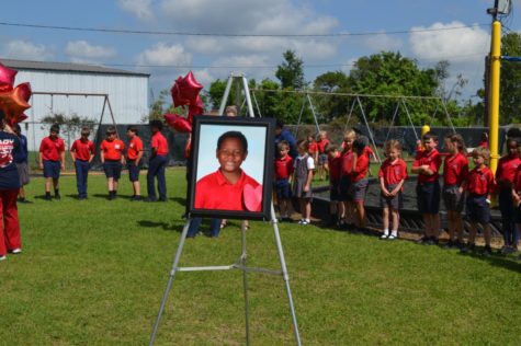 Riverside Academy students and teachers held a balloon release to remember third grader Samuel Frank. 