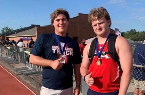 Shot putters Noah Trepagnier, left, and Scott White have qualified for the State Track Meet. 