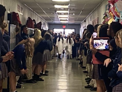 The Class of 2023 received their caps and gowns and made their final walk through the school on May 9. 