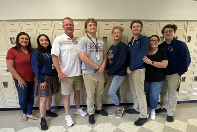 From left, teacher Tara Loving and her daughter Camryn, coach John White and his son Scott, teacher Sonya Mazzella and her son Thomas and teacher Erin Jung and her son Jeremy are savoring the final days of school together. 