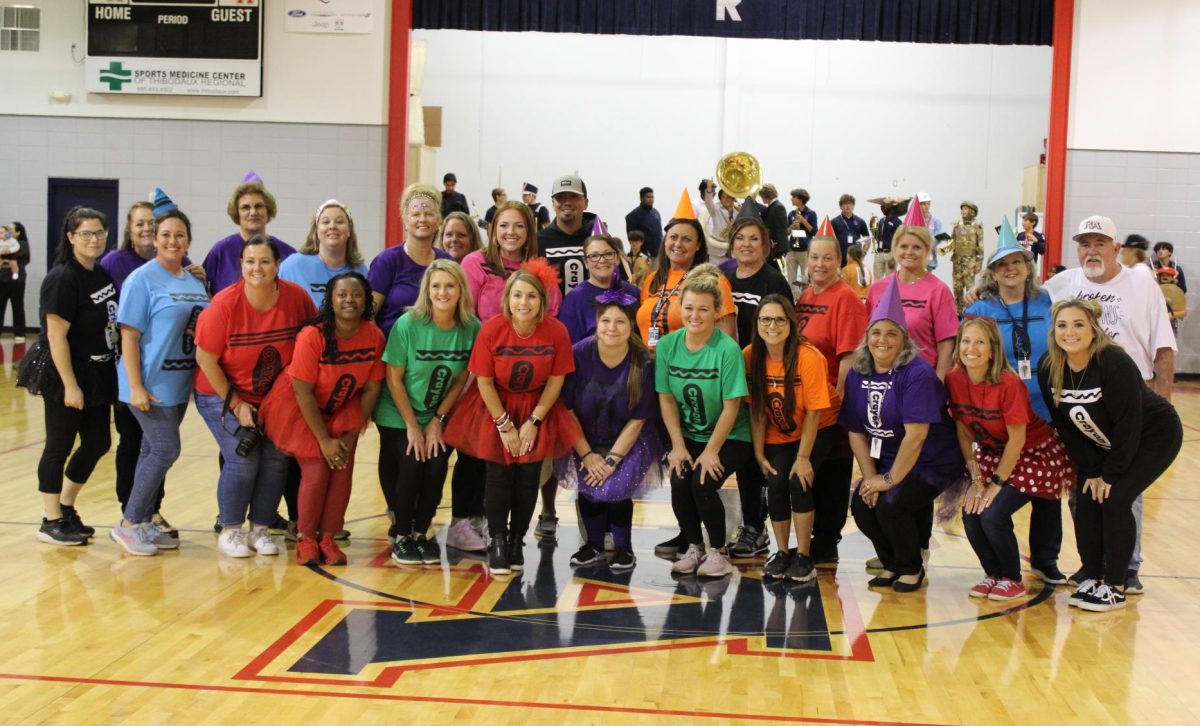 The Riverside Academy faculty dressed as crayons for Fridays pep rally. 