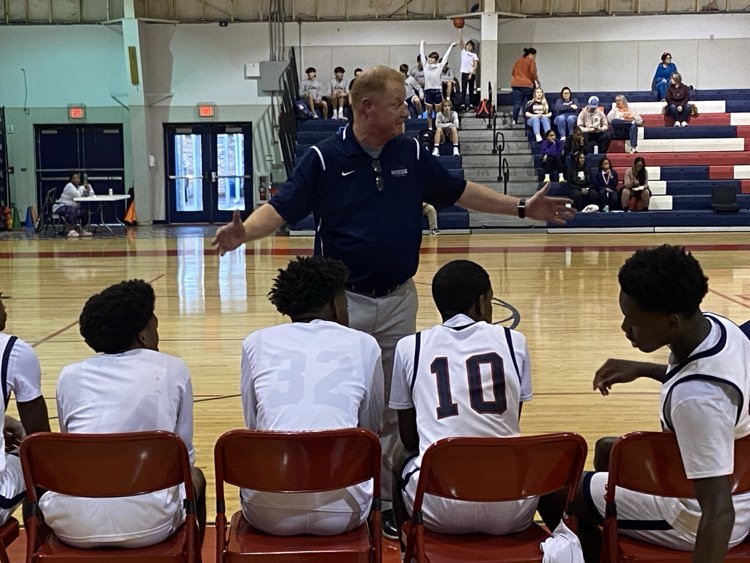Rebels head basketball John White has his team in the second round of the playoffs.