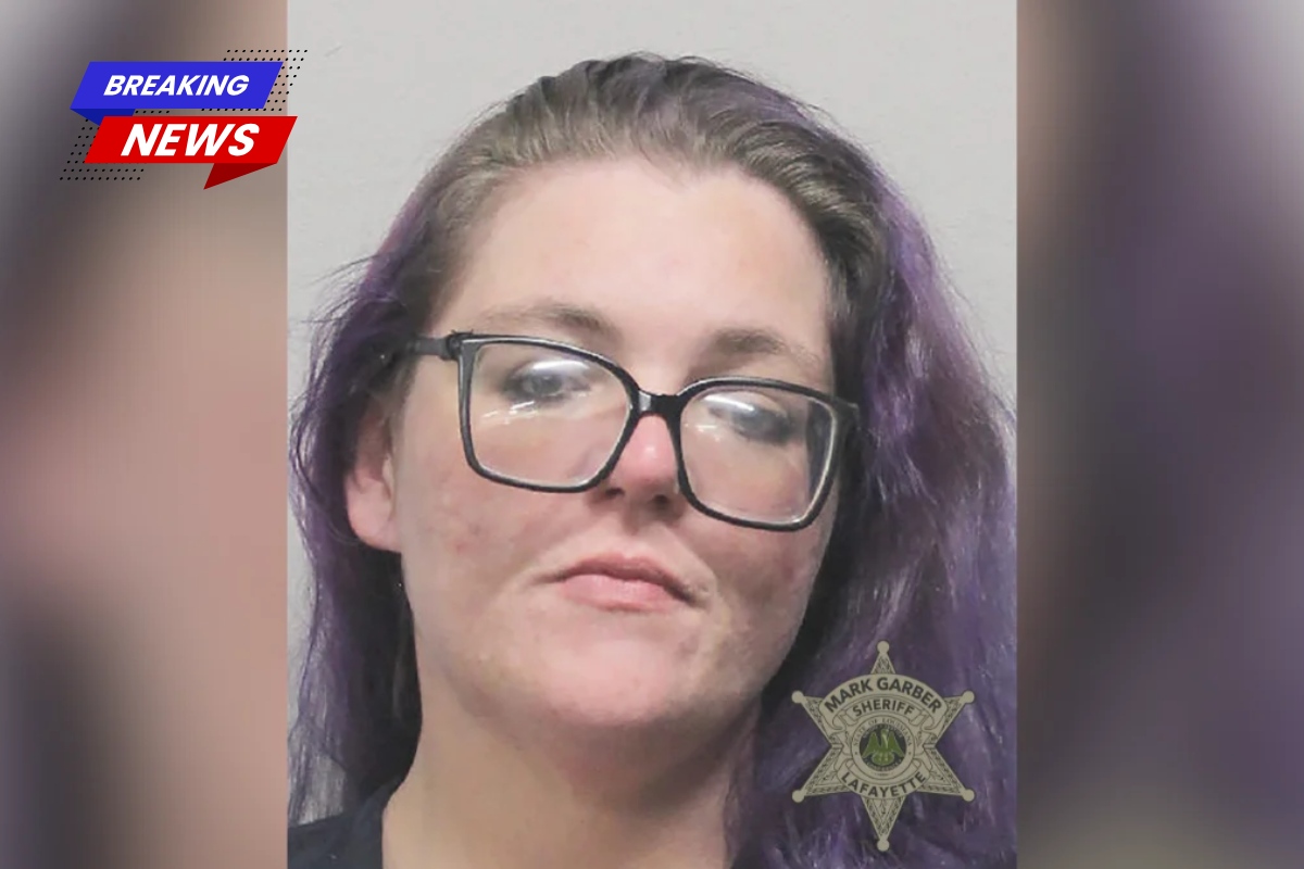 A Lafayette Parish woman was arrested after drugs, including more than 1,000 fentanyl pills, and guns were discovered in her home